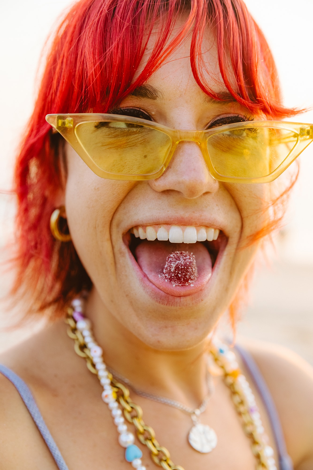 Young woman enjoying a cannabis gummy