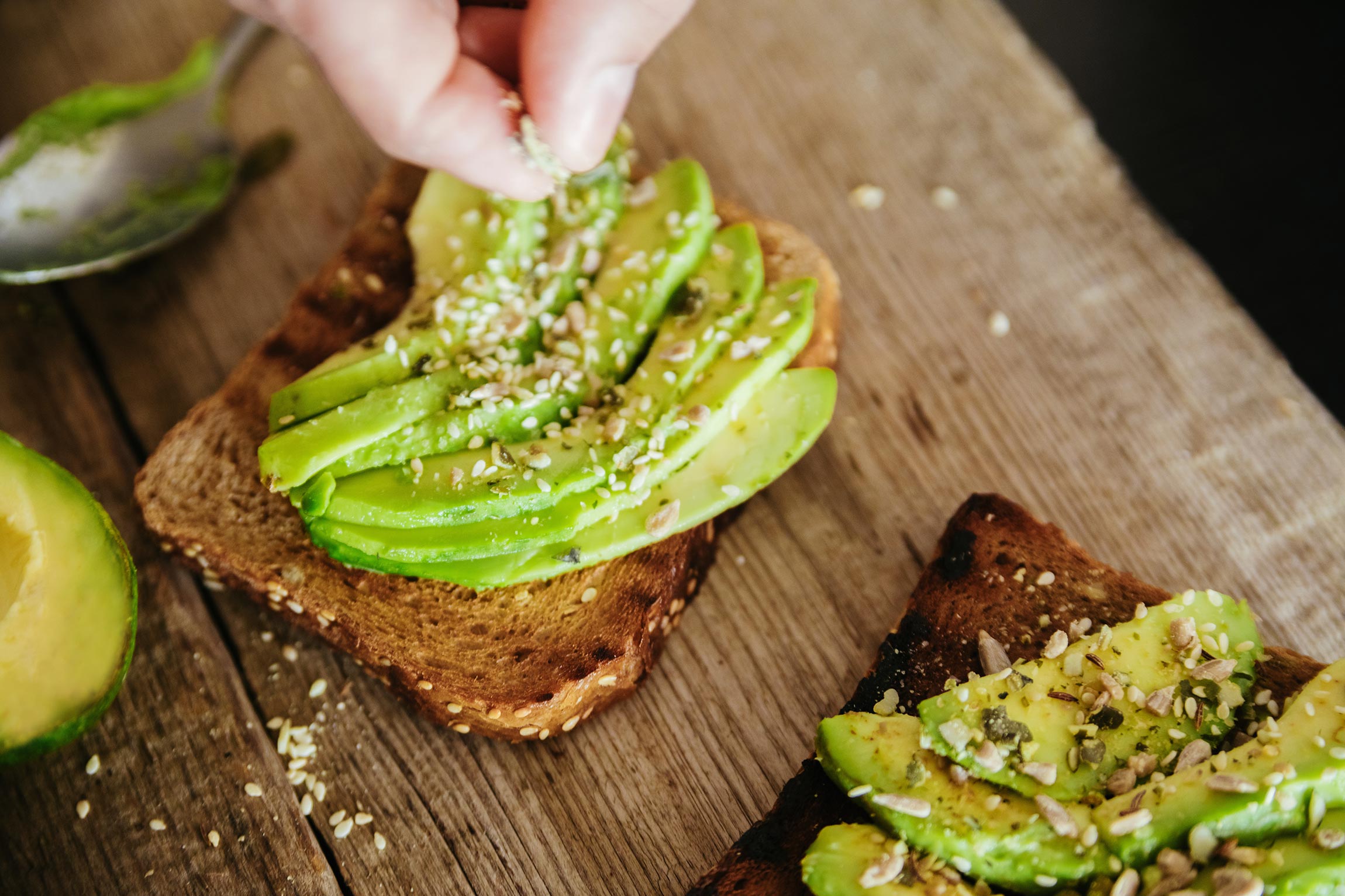 Photo showing two slices of avocado toast