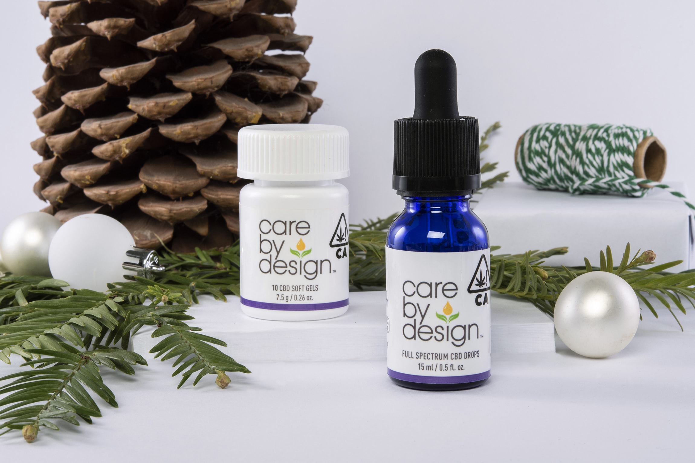 Care By Design products against a holiday-themed background