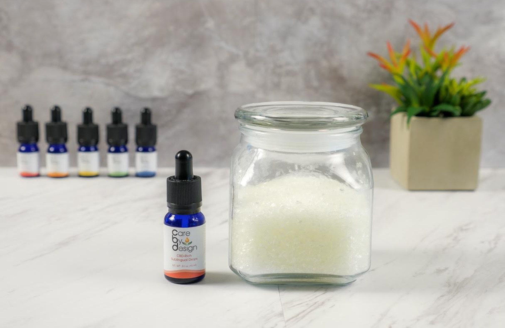 Care By Design tincture with white bath salts