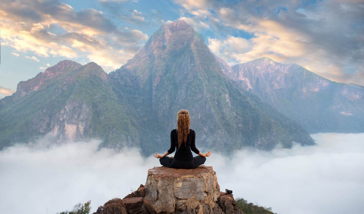 meditating on a mountain