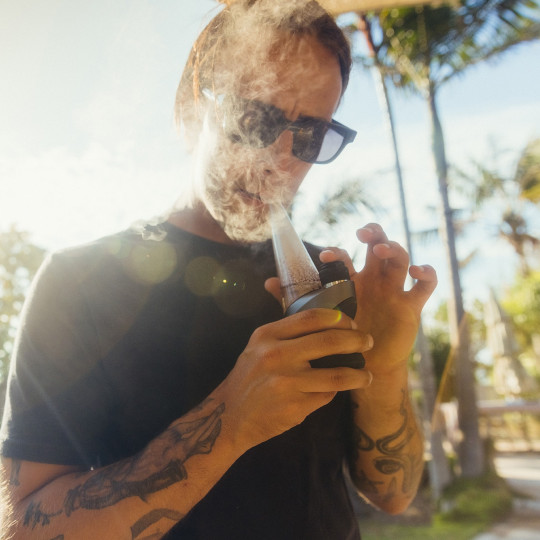 A man smoking photo