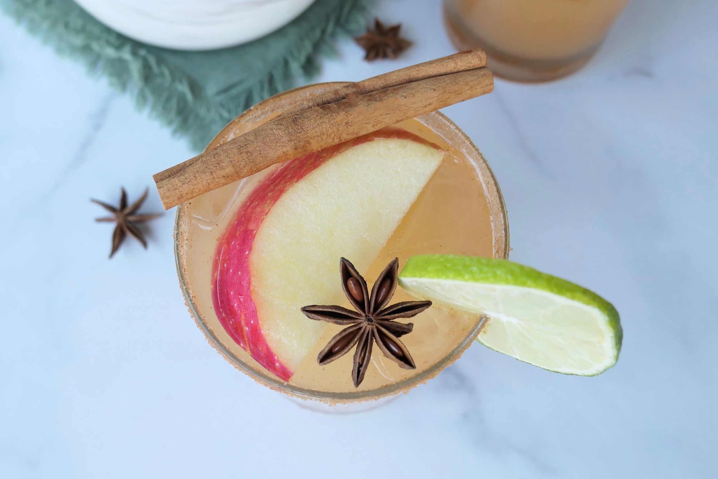 Overhead shot of a Apple Margarita garnished with a star anises